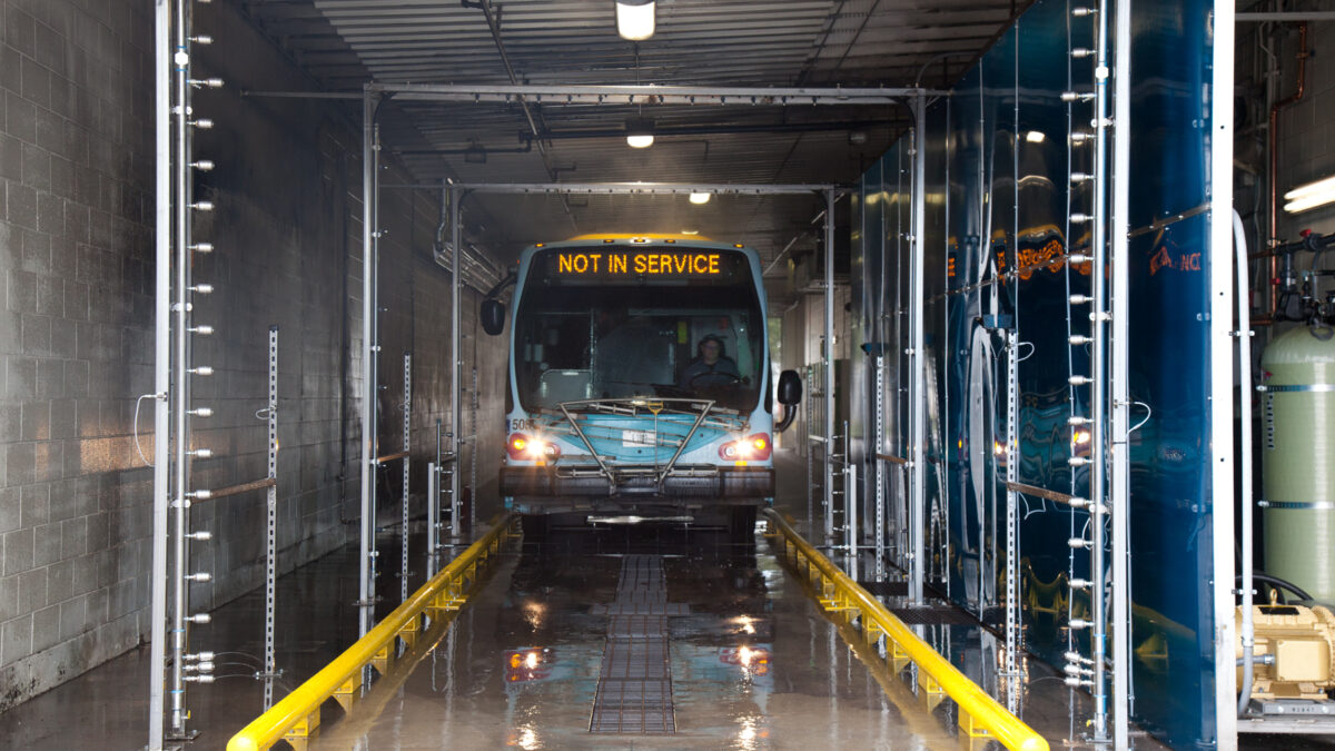 Bus driving-thru a new bus wash installation, Missoula, MT
