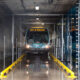 Bus driving-thru a new bus wash installation, Missoula, MT
